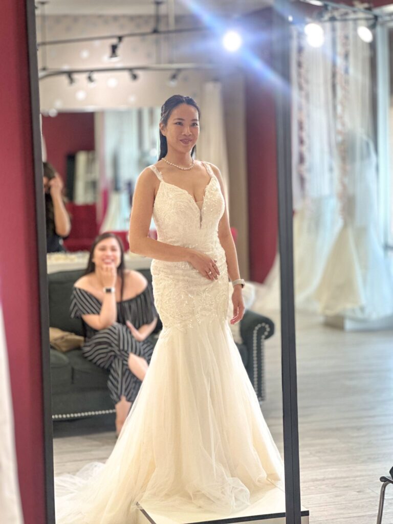 bride trying on wedding dresses in whittier california bridal store