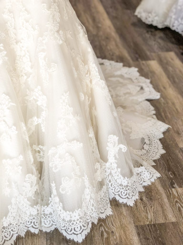 scalloped lace hem on discount designer wedding dress in Hayward, CA