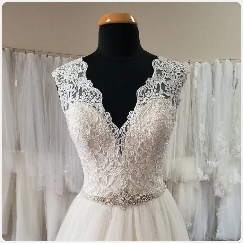 cap sleeve lace aline wedding dress with beaded belt