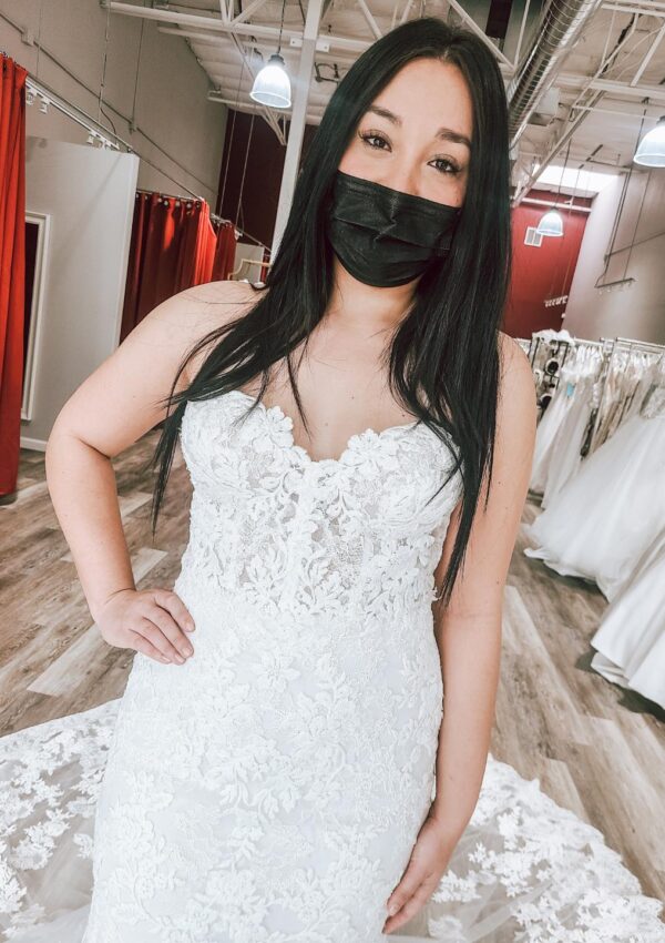bride wearing mask in discount designer wedding dress oakland california