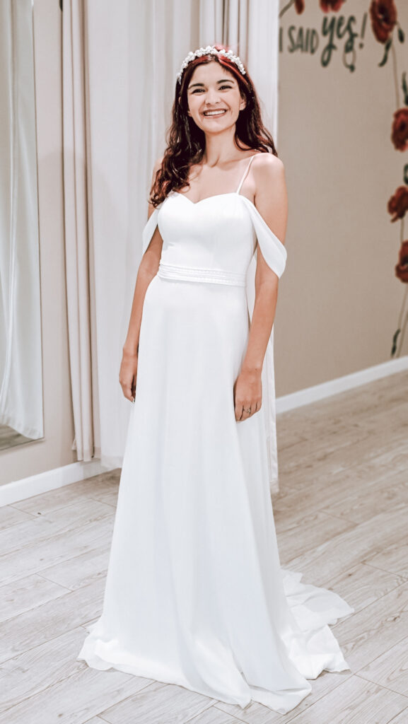 bride with simple wedding dress with removable straps