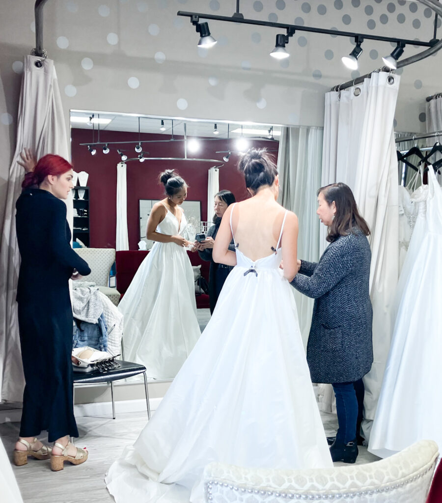 bride trying on wedding dress in whittier california bridal shop