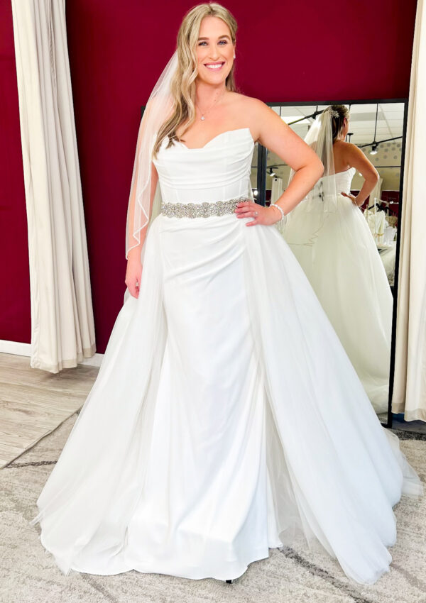 classic crepe wedding dress with tulle overskirt added at whittier california bridal shop