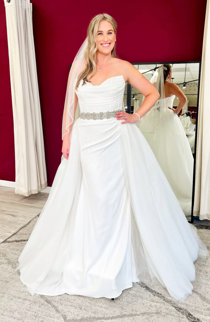 classic crepe wedding dress with tulle overskirt added at whittier california bridal shop