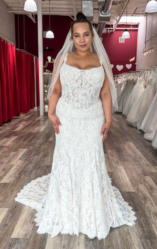 plus size bride wearing gorgeous garden wedding dress in oakland california bridal store