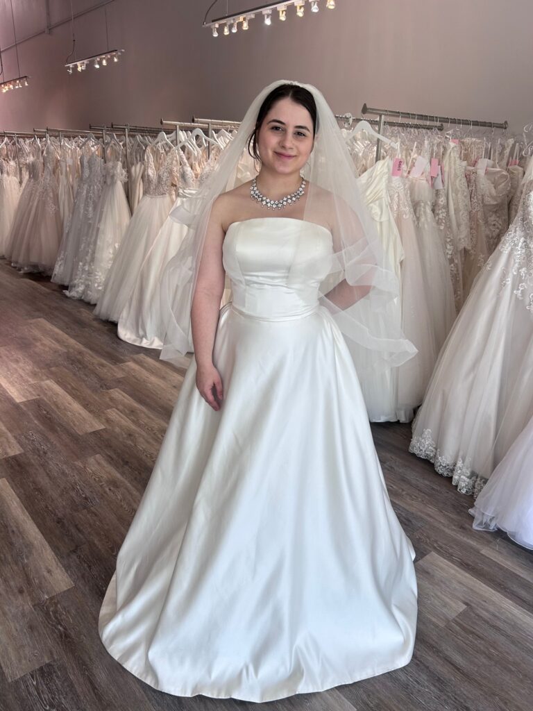 short bride wearing satin aline wedding dress