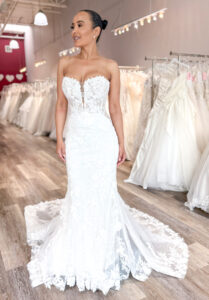 bride wearing lace mermaid wedding dress in hayward bridal store